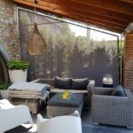 Fermeture de terrasse fixe et permanente chez un particulier