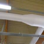 Installation de gaines textiles Tecvoilair® dans un grand volume
