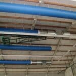 Installation de gaines textiles Tecvoilair® Meltem dans un hall omnisport