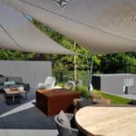 Installation d'une voile d'ombrage Pampero sur la terrasse d'un particulier